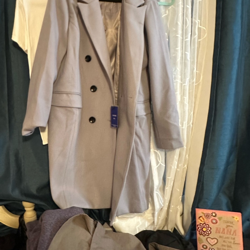 Stylish Light Gray Double-Breasted Wool and Polyester Coat fully lined.